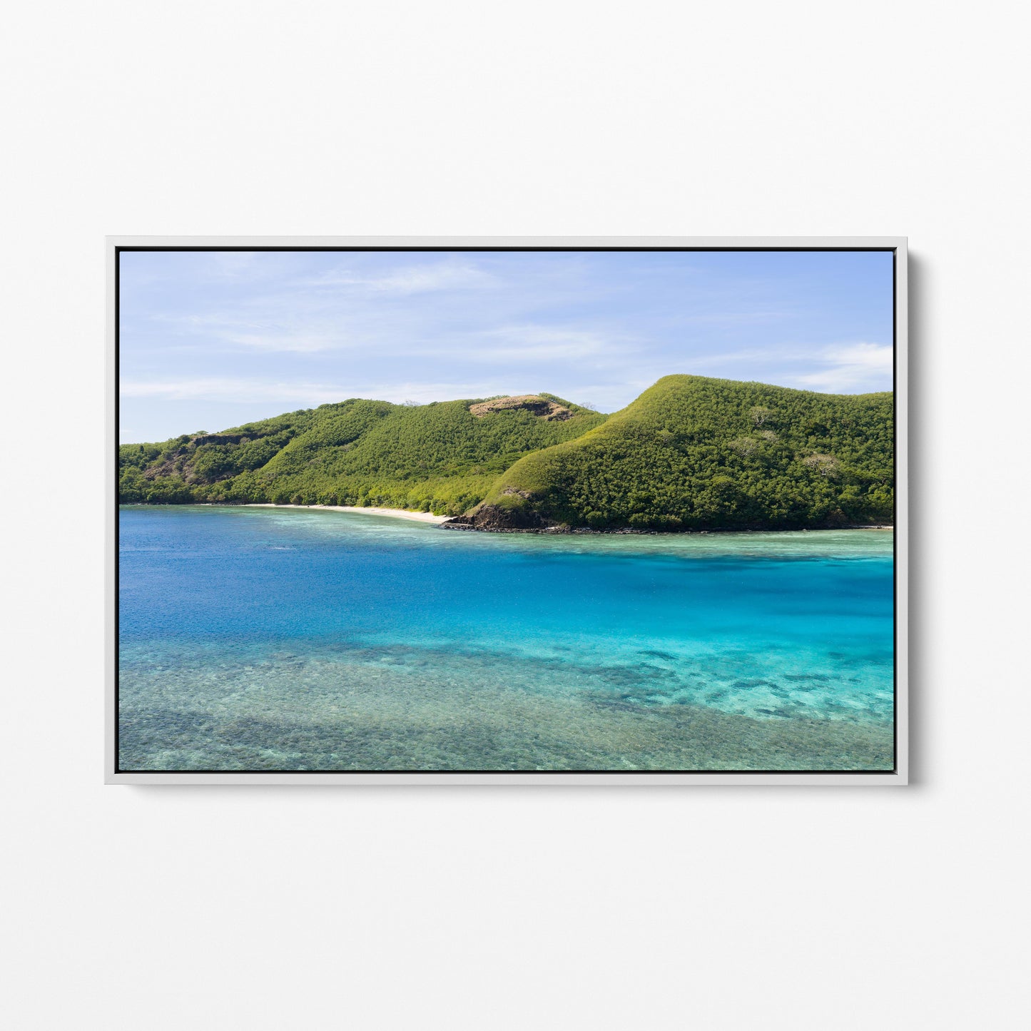 Manta Ray Island ridge and cove beach in Fiji in a white frame
