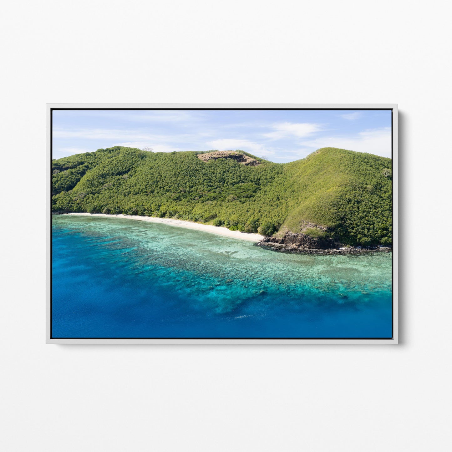 The rocky point at Manta Ray Island in Fiji in a white frame