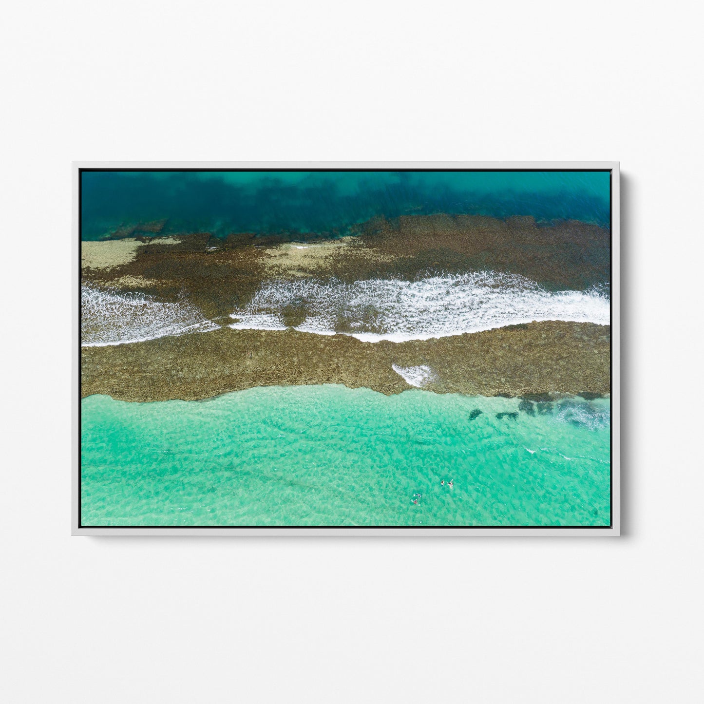 Reef and breaking water at Yanchep Lagoon, in a white frame