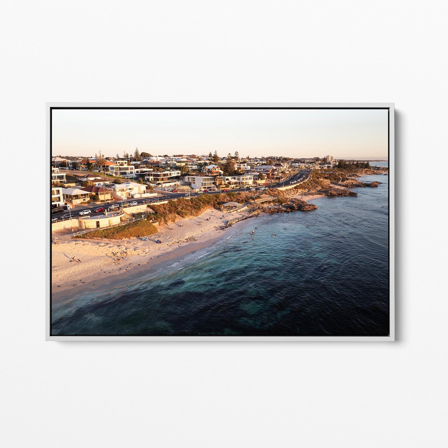 Trigg coastline sunset white framed canvas
