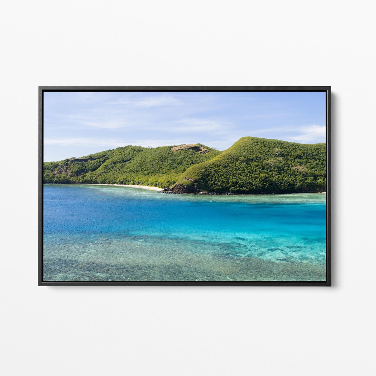 Manta Ray Island ridge and cove beach in Fiji in a black frame
