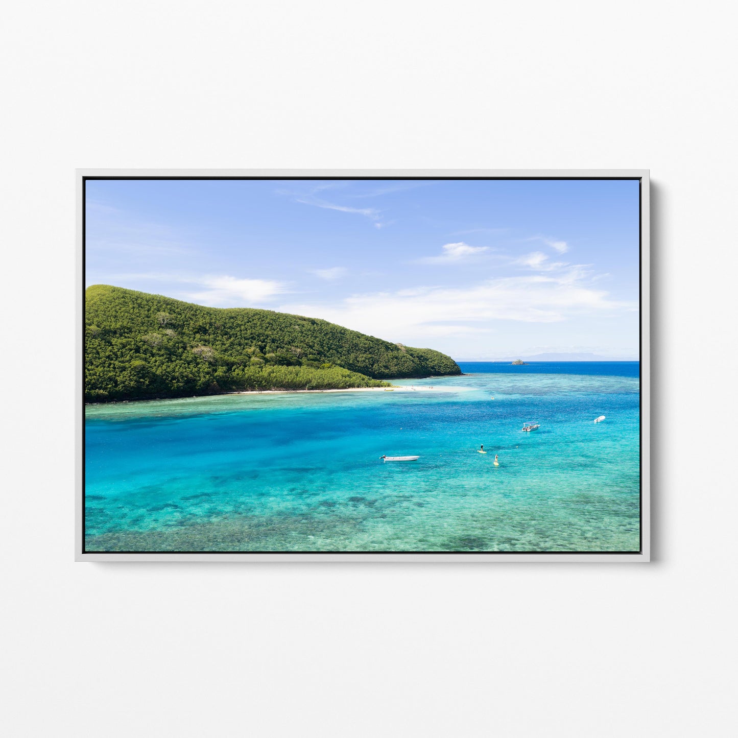 Manta Ray Island above its turquoise lagoon in Fiji in a white frame