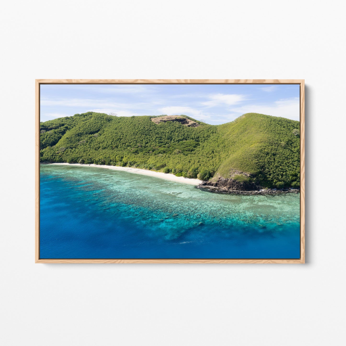 The rocky point at Manta Ray Island in Fiji in an oak frame