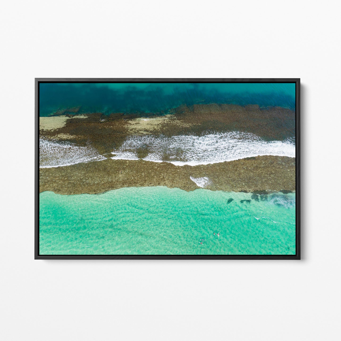 Reef and breaking water at Yanchep Lagoon, in a black frame