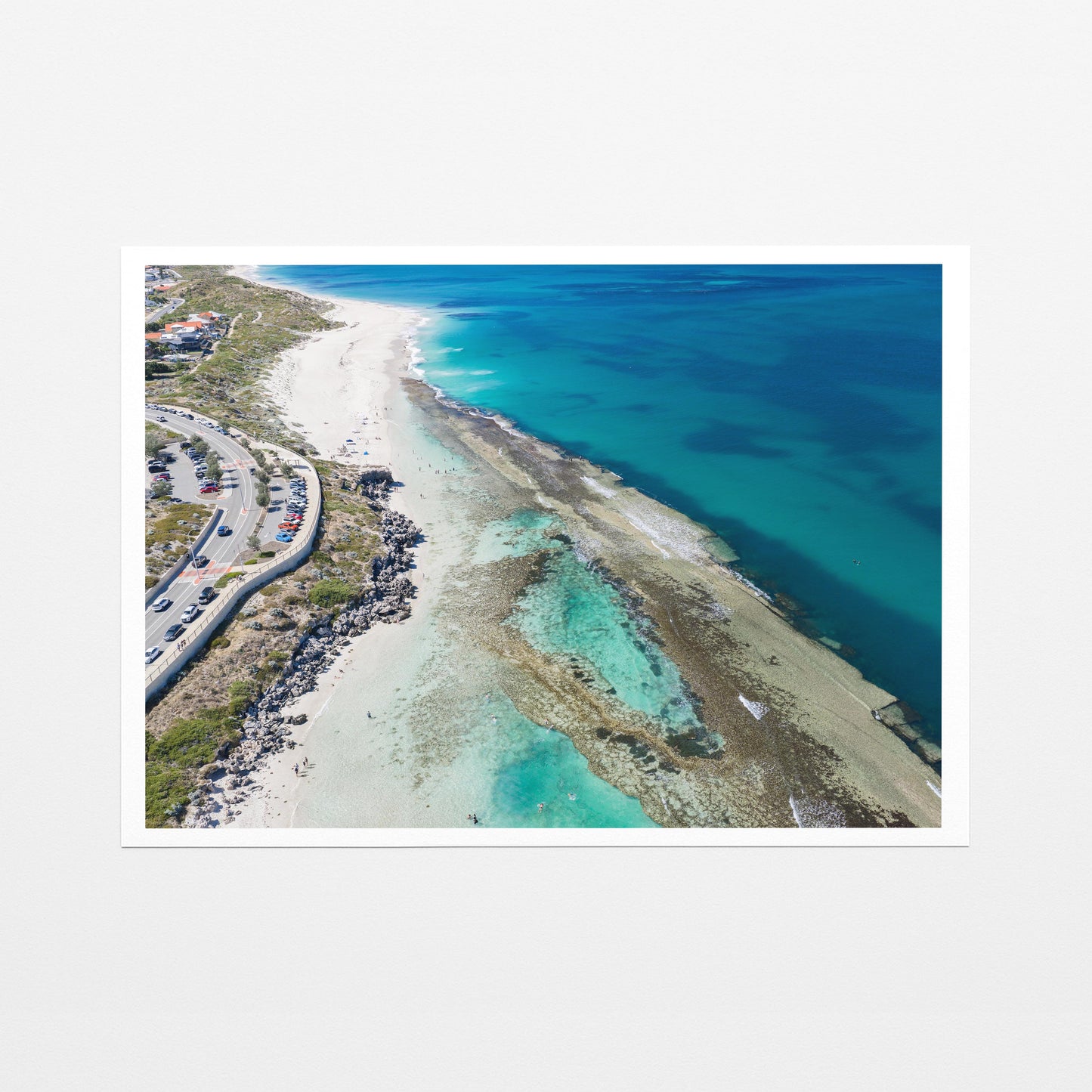 The reef spreading through the water at Yanchep Lagoon, printed on fine art paper with a white border