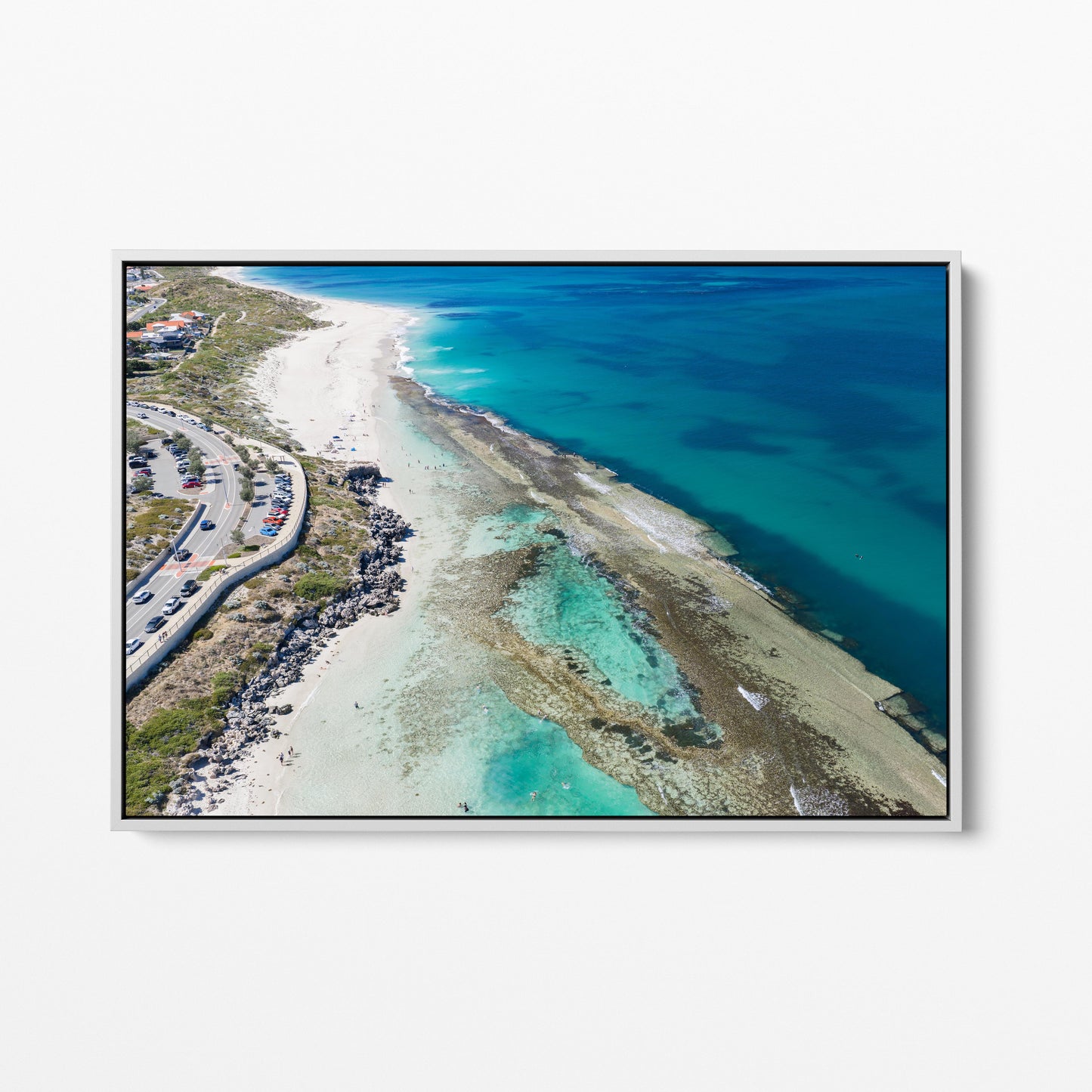 The reef spreading through the water at Yanchep Lagoon, in a white frame
