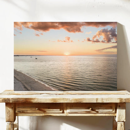 Stretched canvas print of the sun setting over Geographe Bay at Busselton, leaning on a timber bench