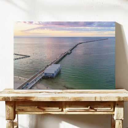 Stretched canvas print of Busselton Jetty running to the horizon after sunset, on a timber bench