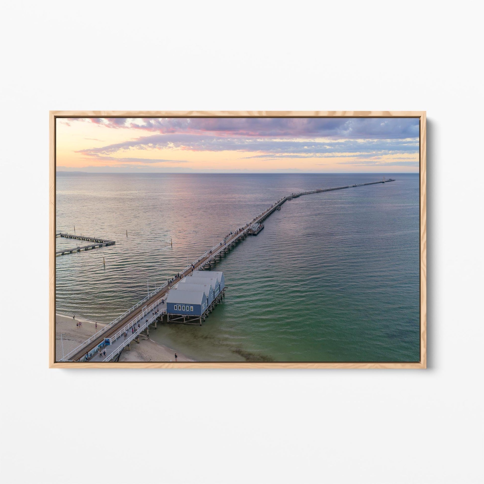 Oak framed canvas print of Busselton Jetty running to the horizon after sunset, Western Australia