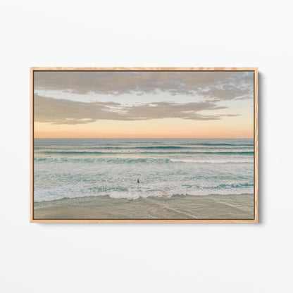 Oak framed canvas print of surfers in the lineup at Duranbah Beach at sunset, New South Wales
