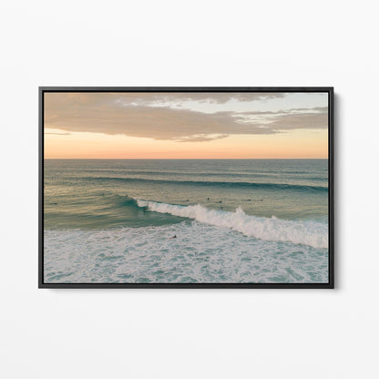 Black framed canvas print of a breaking wave at Duranbah Beach at sunset, New South Wales