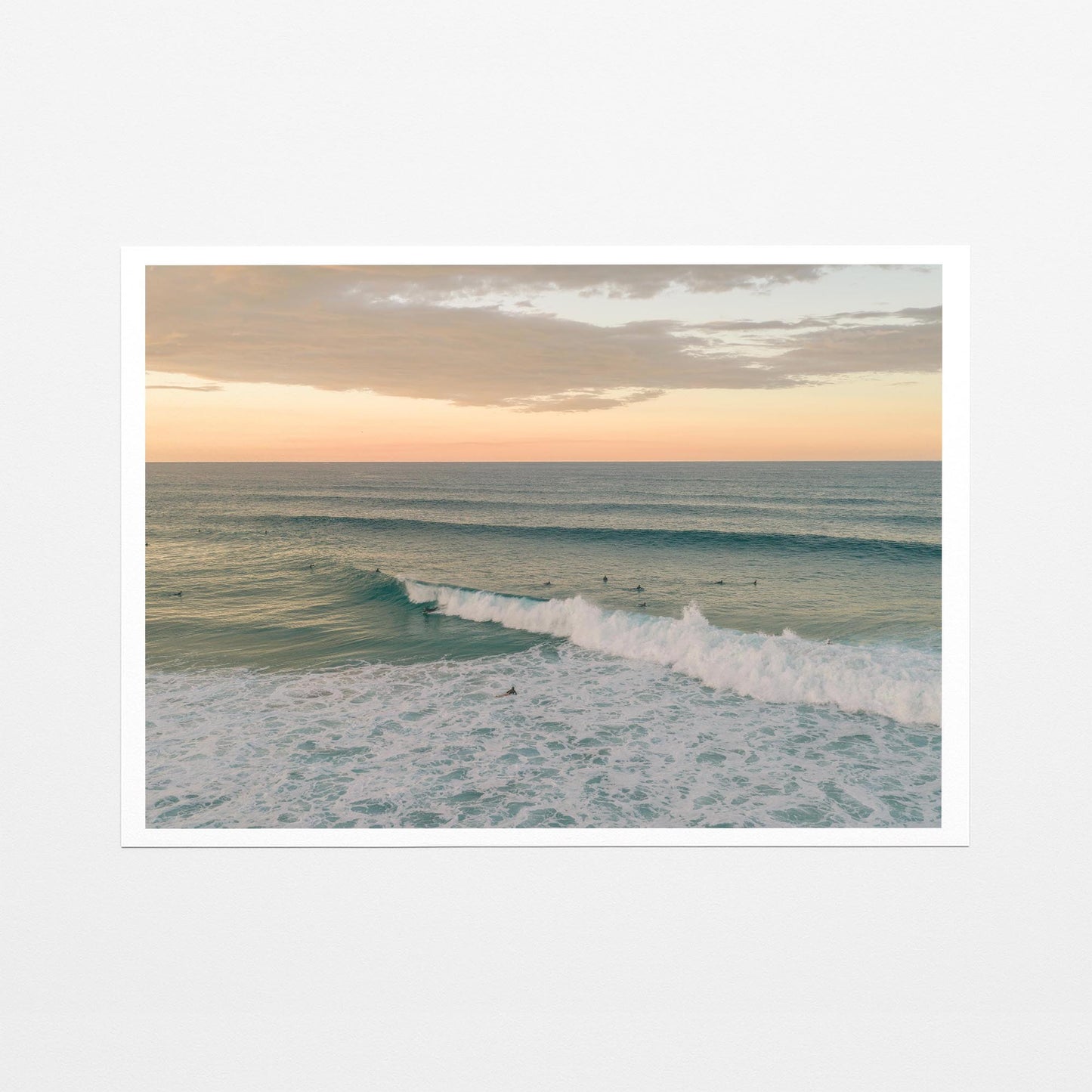 Fine art paper print of a breaking wave at Duranbah Beach at sunset, with a white border