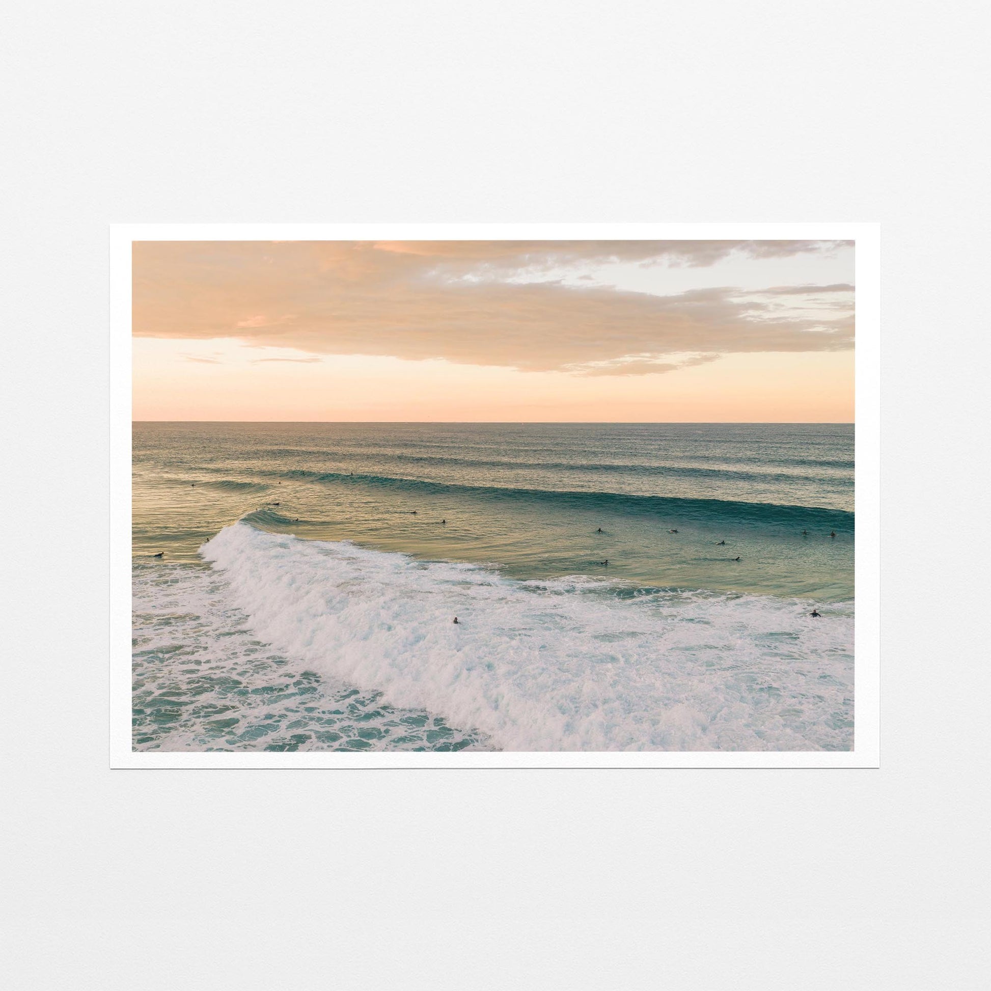 Fine art paper print of a long line of swell at Duranbah Beach at sunset, with a white border