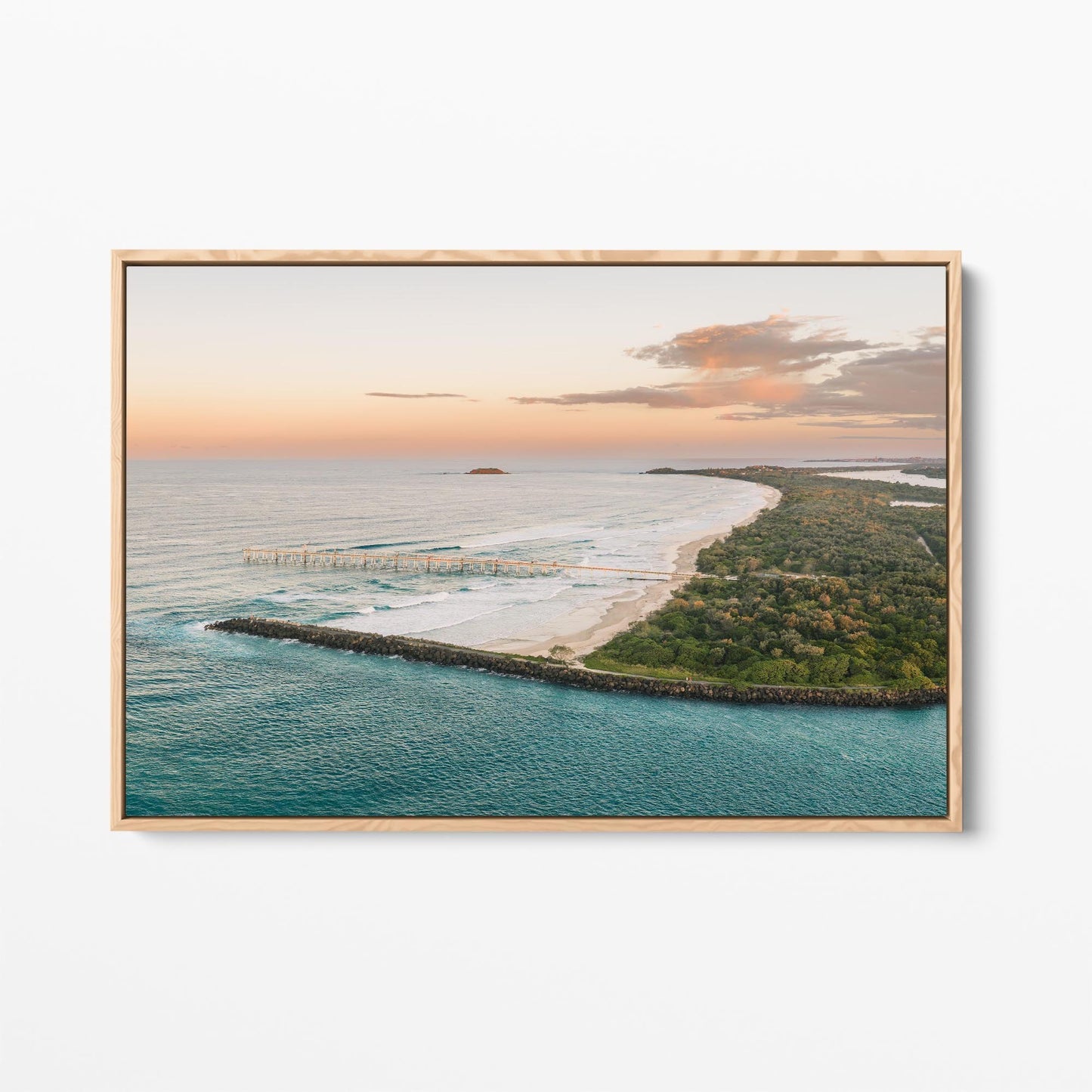 Oak framed canvas print of the headland and curving beach at Duranbah at sunset, New South Wales