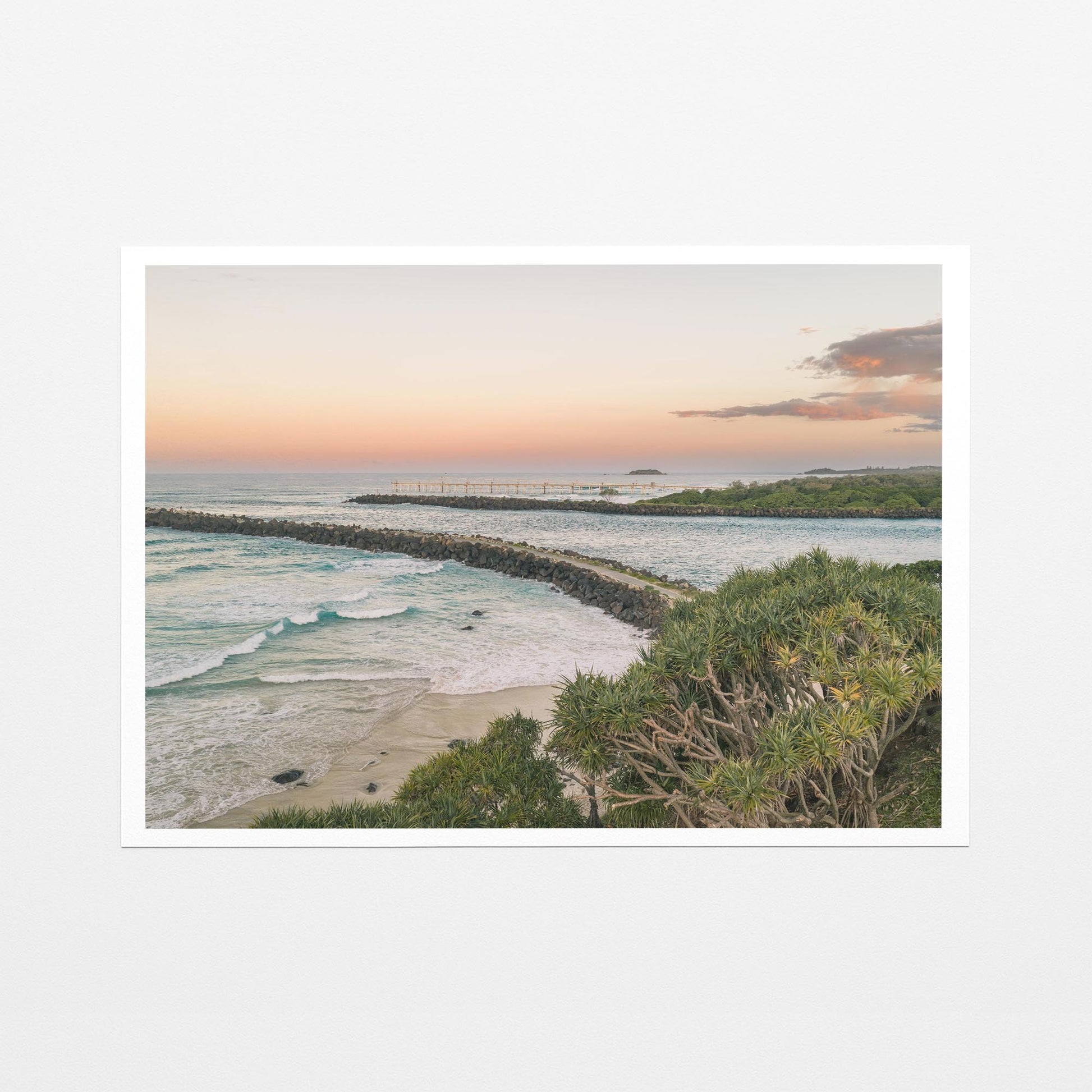 Fine art paper print of the breakwall at Duranbah Beach at sunset, with a white border