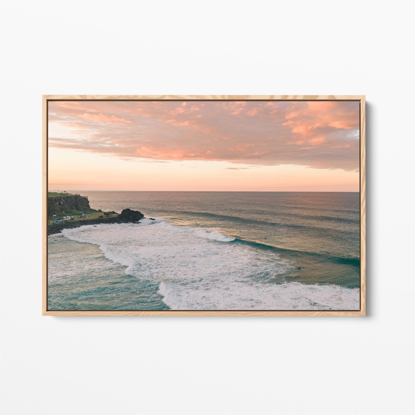 Oak framed canvas print of pink sunset cloud over the point at Duranbah, New South Wales