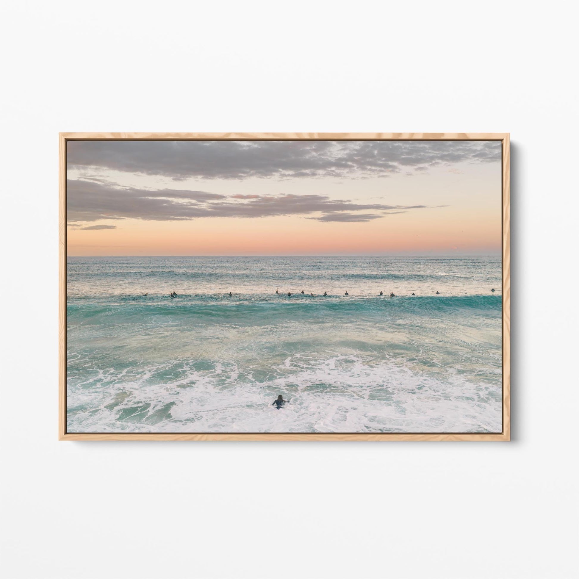 Oak framed canvas print of the surfing lineup at Duranbah Beach at sunset, New South Wales