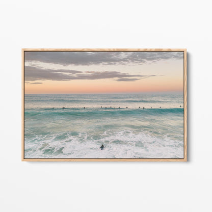 Oak framed canvas print of the surfing lineup at Duranbah Beach at sunset, New South Wales