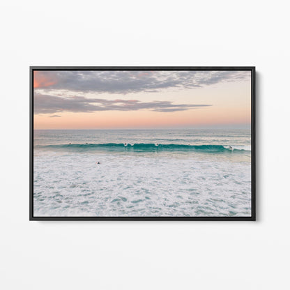 Black framed canvas print of a lone surfer at Duranbah Beach at sunset, New South Wales
